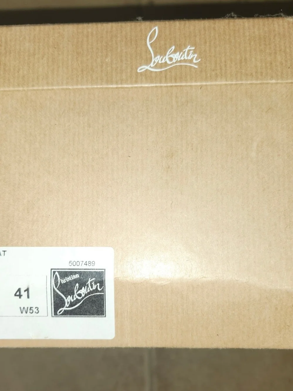 Christian Louboutin sleek white